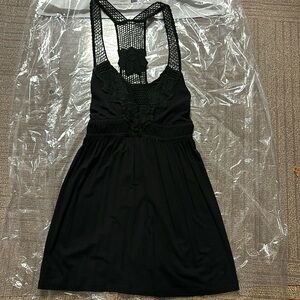 Lush black top with lace detail. Size Small. Excellent used condition.